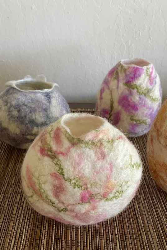 PQ There was a boundless, endless curiosity of each artist about what fibers could do. Photos courtesy of Petaluma Arts Center VASE CASE Felt vases by Karla Jacobs.